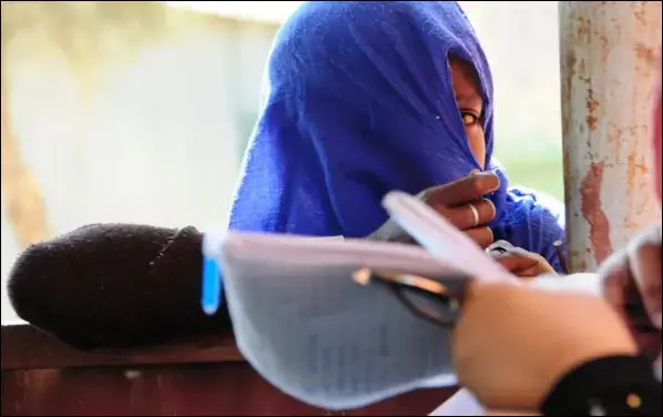 Women and girls share with Mariam their first experience with menstruation